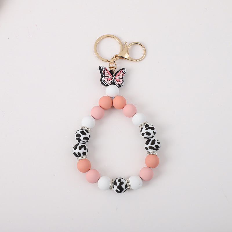 Wholesale Rubber Tassel Silicone Wood Water Keychain